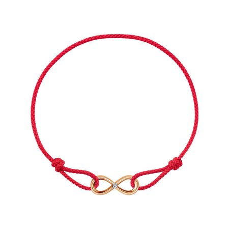 Красная нить с золотой вставкой