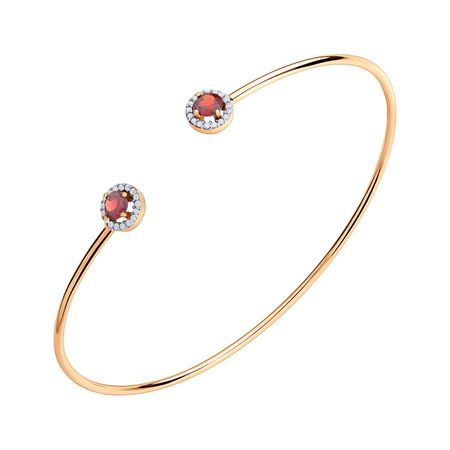 Золотой жесткий браслет с гранатом и фианитами с родированием