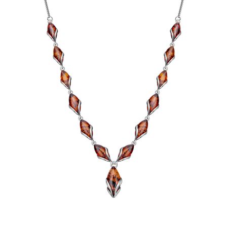Серебряное колье с янтарем и платинированием