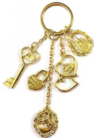 Брелок мет. гроздь фигурн. СПБ цв.золото