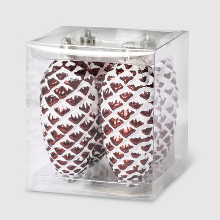 Набор елочных игрушек Unique Treasures коричневый шишки, 4 шт комольцева юлия викторовна новый год от истории елочных игрушек до традиций разных стран 2 е издание