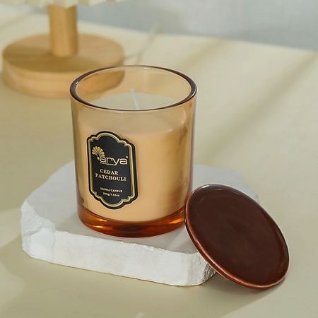 Свеча ароматическая ARYA HOME COLLECTION Ароматическая свеча Cedar Patchouli с керамической крышкой Янтарь